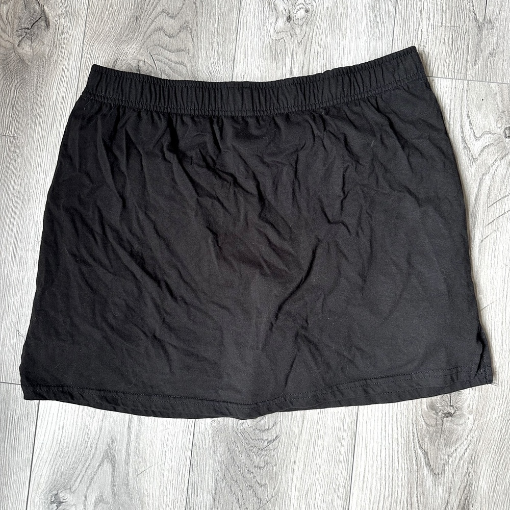 Black skort, size M, mid rise